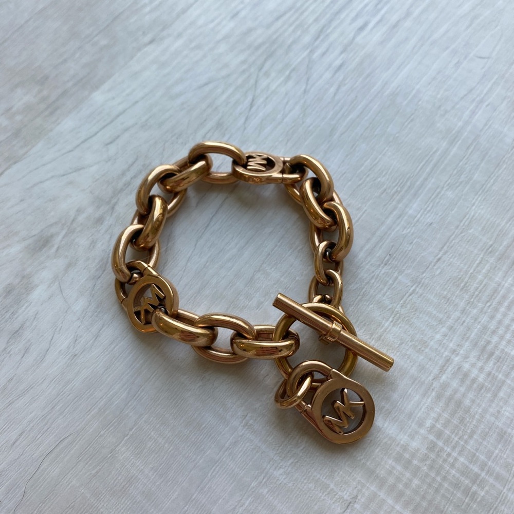 Michael Kors rose gold toggle chain bracelet, padlock charm